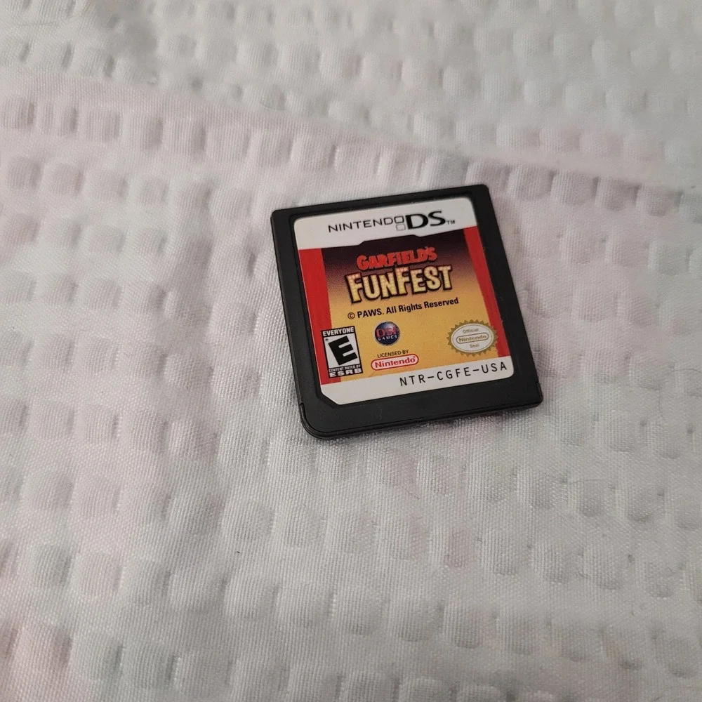 Nintendo DS Game Lot of 7 Garfield Dora Tinker‎ Bell Hello Kitty Pet Vet Santa
